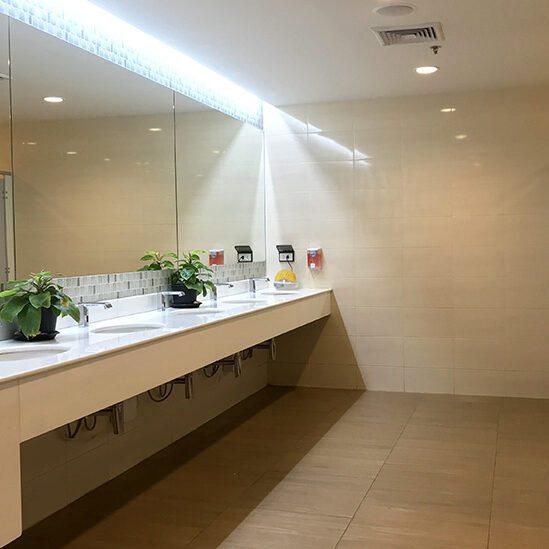 Row of wash sink in public restroom, bathroom design